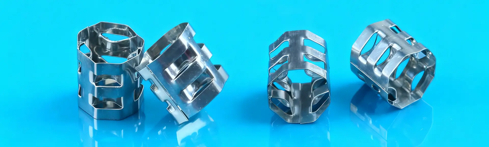 Several metallic VSP rings are placed on the black glass and show different view of products.