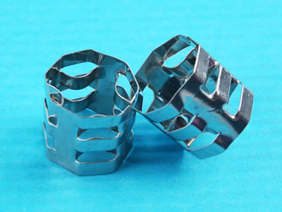 Two metallic VSP ring with one leaning on the other.