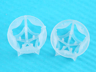 Two plastic pentagon rings show their top side. They have round outer and pentagonal inner top.